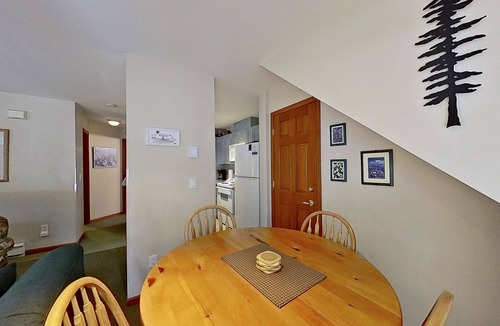 Village North Condo | First-floor condo with fireplace & patio - walk or shuttle to ski lifts