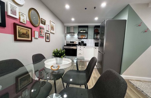 Downtown Apartment | Flamingo Jungle: Tropical-Themed Getaway
