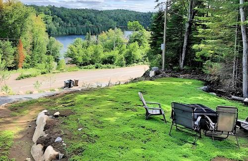 Sainte-Marguerite-du-Lac-Masson House | Forest Chalet with Hot Tub & Lake Views near Mont Saint-Sauveur