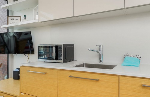 Victoria West Condo | Gallery - Light and photo art filled modern studio in Victoria's Chinatown by Victoria Prime!