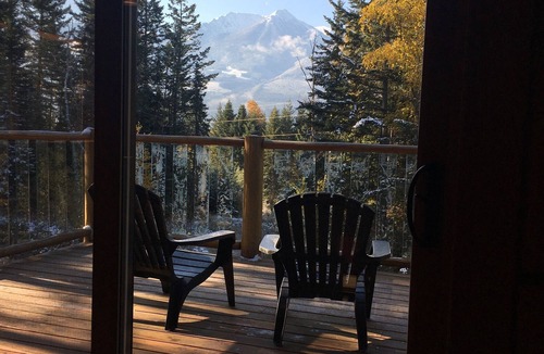Golden House | Golden Log House above the Valley
