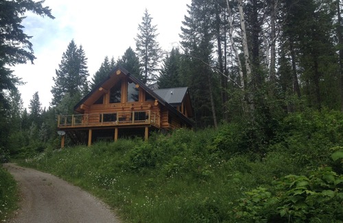 Golden House | Golden Log House above the Valley