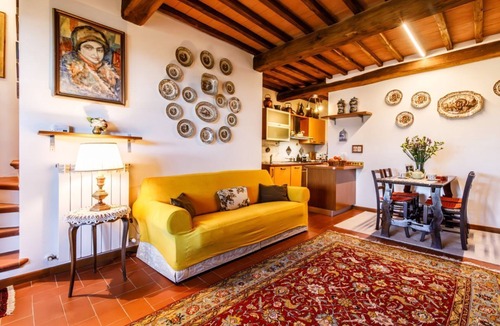Monteaperti Apartment | GuestHost - Nestled between the Crete Senesi and Chianti, this home offers a breathtaking view of the countryside and Siena, just a 10-minute drive away. Part of a renovated historic farmhouse, it is a well-furnished townhouse with a private garden and v