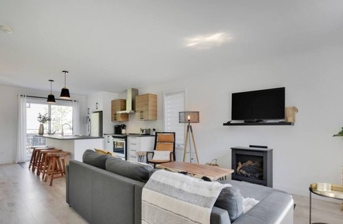 Pont-Rouge Ski Chalet | Halte | Détente familiale | Spa et Sauna