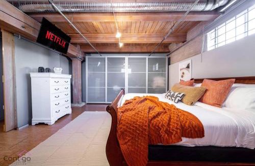 Downtown Edmonton Apartment | Historic JD Loft, Near ICE District, Rogers Place, UG Parking