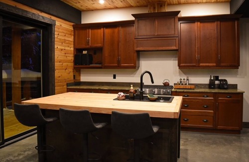 Rossland House | House with bridge, walk around deck, rooftop patio, 24' glass door & much more!