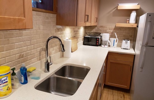 Southwest Calgary Apartment | Ideal furnished 550 sq. ft legal conforming basement suite with bright interior.