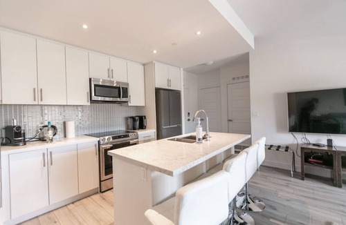 Innisfil Apartment | Innisfil 2BR Condo | Balcony, BBQ & Fire Table