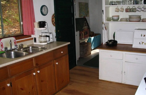 Lake of Bays Cottage | Lake of Bays - patio and deck at waters edge, sun all day from 11:00 AM.