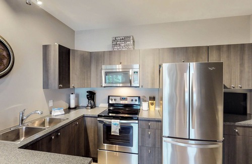 Christina Lake House | Lakeside Home with Peaceful Location, Lovely Views, Private Beach & Dock