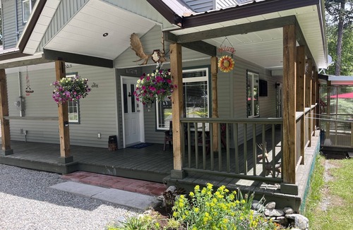 Kootenay Boundary House | Large Lakefront Home w Private Dock & picturesque Mountain Views on Jewel Lake!