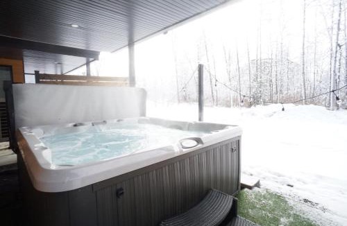 Magog Apartment | Le Memph Chouette spacious comfortable condo cottage eco responsible 3 bedrooms private garage - hot tub & pool Memphrémagog Lake