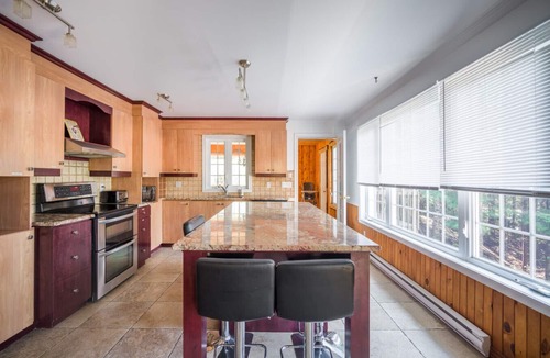 St-Adolphe-d'Howard Cottage | Le Rocher St-Joseph – Lakefront Chalet with Spa, Pool & Game Room