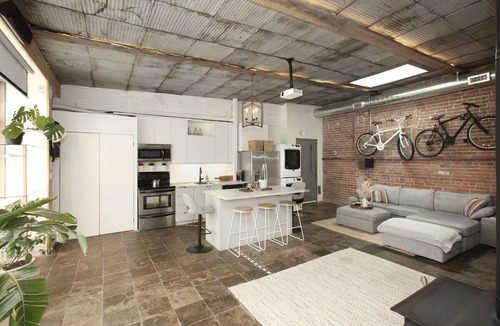 Leslieville Apartment | Leslieville LOFT with Wood Burning Fireplace and Skylights! Parking Included.