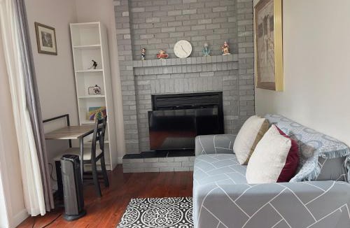 Southwest Calgary House | Lily room near golf and banff costco newly renovated queen size bed Single bathroom sofa TV