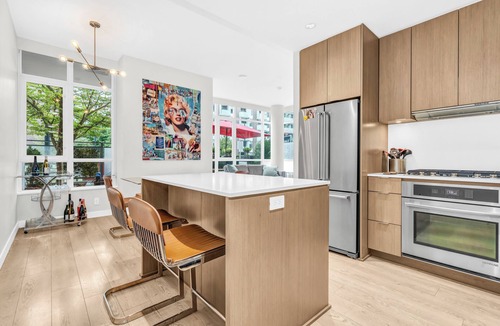 West Side House | Location! Modern Urban Oasis with Premium King Size Beds and a Home Office