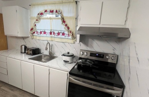 Montreal Apartment | Lovely half basement Apt near highway