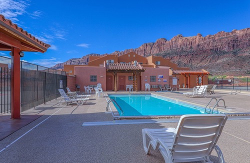 Moab South Valley House | Lovely townhome near town with pool, hot tub, playground, patio & tennis