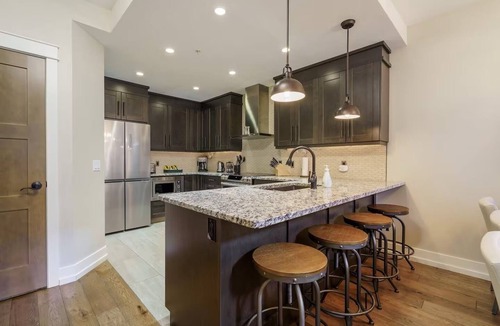Canmore Condo | Luxurious 2-Story Penthouse | 5 Beds | Water Park Access | 5-Star Mountain Views