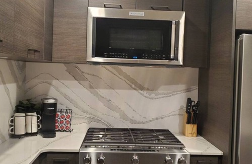 Cultural District Condo | Luxury condo with pool! Steps to beach/downtown!