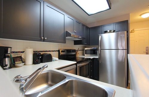 Village North Condo | Marketplace Lodge #212 | Studio with Kitchen, Fireplace, and Balcony