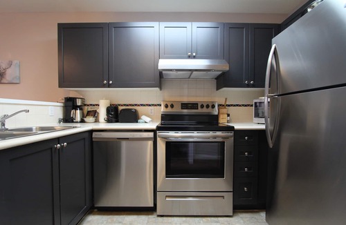 Village North Condo | Marketplace Lodge #212 | Studio with Kitchen, Fireplace, and Balcony