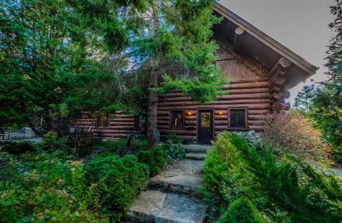 Lion's Head House | Massive Rustic Waterfront Log Cabin