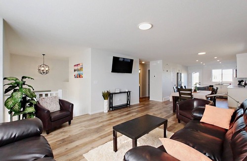 Red Deer House | Modern 4 Bedroom House for 8 Guests in Red Deer ~ Games Room, Fire Pit, A/C, BBQ