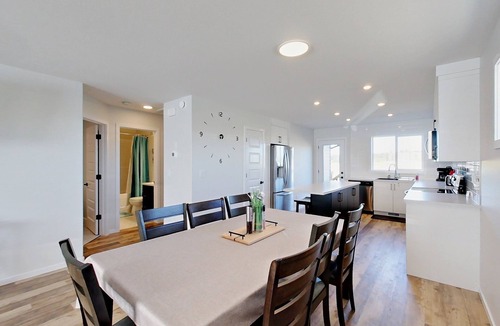 Red Deer House | Modern 4 Bedroom House for 8 Guests in Red Deer ~ Games Room, Fire Pit, A/C, BBQ