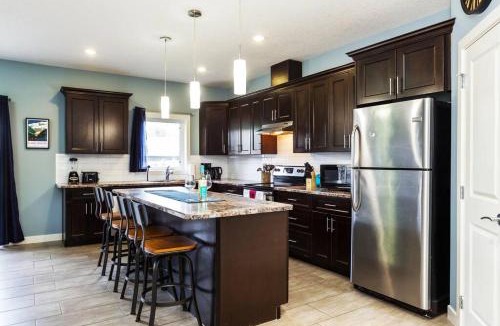 Jasper Place Apartment | Modern Home - King Bed - Garage - Long Stays