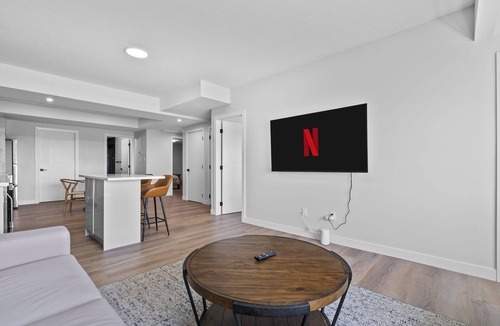 Leduc County House | Modern home-style space close to airport.