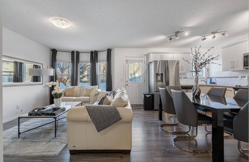 Southwest Calgary House | Modern House with Private Backyard and Fireplace