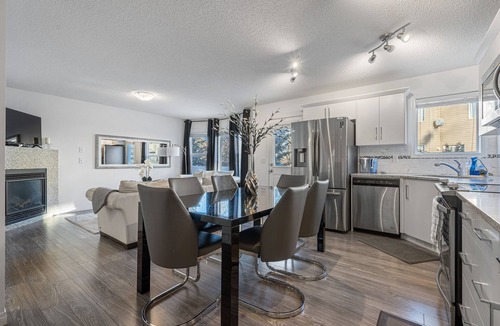 Southwest Calgary House | Modern House with Private Backyard and Fireplace