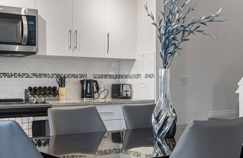 Southwest Calgary House | Modern House with Private Backyard and Fireplace