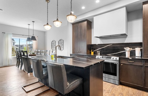 Cochrane House | Modern Luxury Retreat | 4BR w Hot Tub, Garage