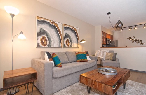 Village North House | Modern quiet townhome with private HOT TUB, GAS fireplace, common Pool and hot tub.