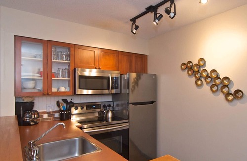 Village North House | Modern quiet townhome with private HOT TUB, GAS fireplace, common Pool and hot tub.