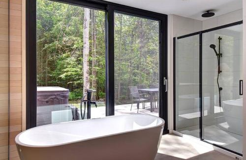 Lac Superieur Village Ski Chalet | Modern Scandinavian Chalet with Jacuzzi, Pool, Lake