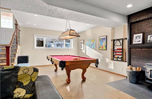 Northwest Calgary House | Mountains, river, parks, close to downtown. 5 Bedrooms, 3 Full bathrooms.