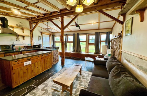 Cymbria Cottage | Natural Home Built in Earthship Style on Waterfront Property