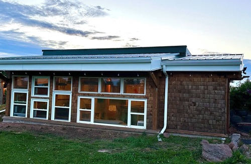 Cymbria Cottage | Natural Home Built in Earthship Style on Waterfront Property