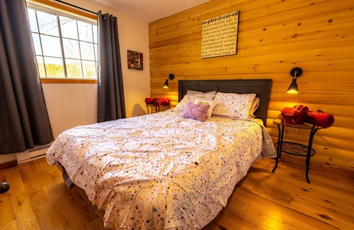 Saint Donat Ski Chalet | Nestled amidst the breathtaking beauty of a mountainous landscape.