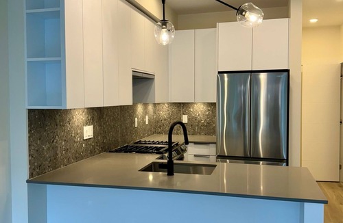 Willoughby Apartment | NEW 1 Bedroom and Den Condo with Balcony in the Heart of Willoughby Town Centre