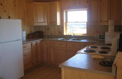 L'Ardoise West House | New Log Home with Gorgeous Ocean View in Historic Acadian Village