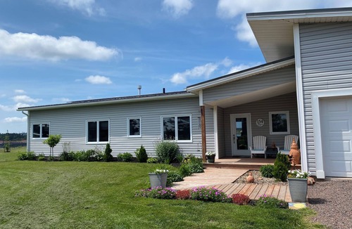 Anglo Rustico House | New Waterfront Modern Home with 180 degree views over Rustico Bay!