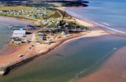 Anne's Land House | North Rustico beach house with million dollar ocean views- 2 min walk to beach!