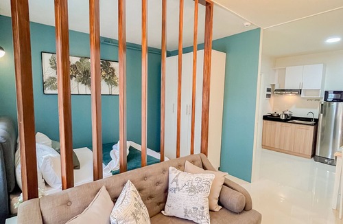Puerto Princesa City Centre Apartment | Ocean Studio1 Bedroom, Private Balcony, Inviting Pool, and Gym