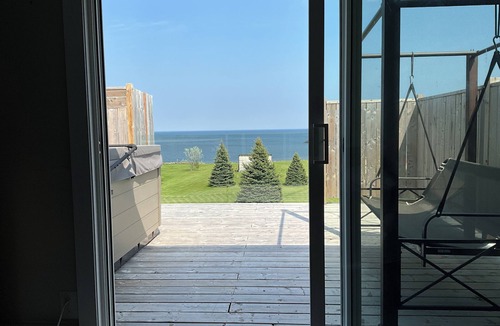 Cormierville House | Oceanfront paradise, 4-bedroom house in Cocagne with hot tub, WiFi, AC.
