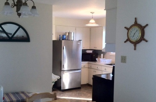 Elmira Cottage | Oceanfront - Sea Seekers - Bed by the Ocean