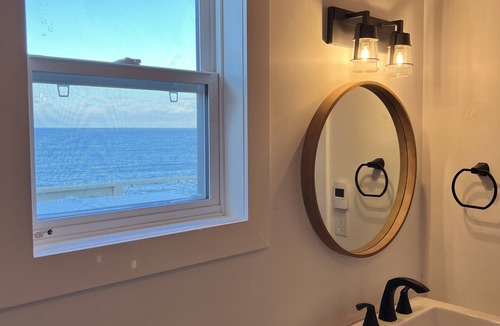 Pouch Cove Cottage | Oceanside Hot Tub Getaway